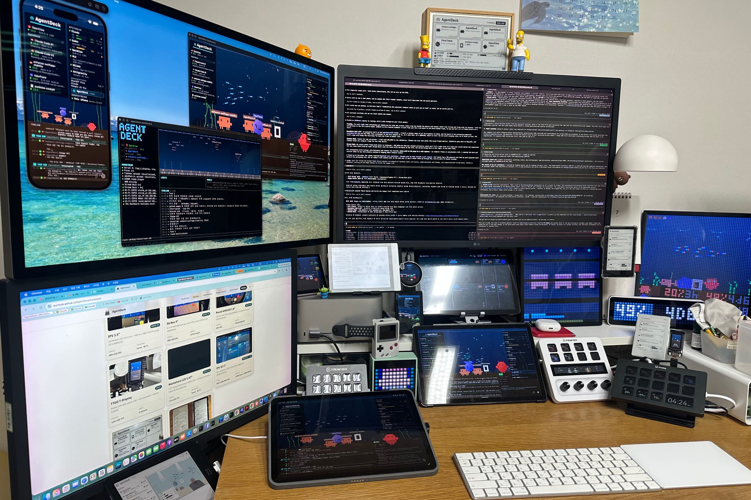 A desk running AgentDeck on every surface at once — monitors, InkDeck e-ink, XTeink readers, Timebox Mini, Pixoo64, TC001, Stream Deck+, Ulanzi D200H, iPad, and phone