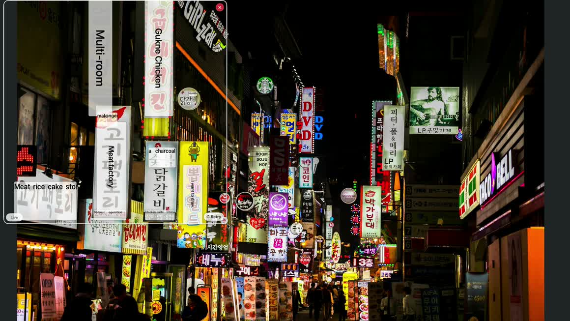 ViewLingo translating Korean neon signs in place, with the original image still visible